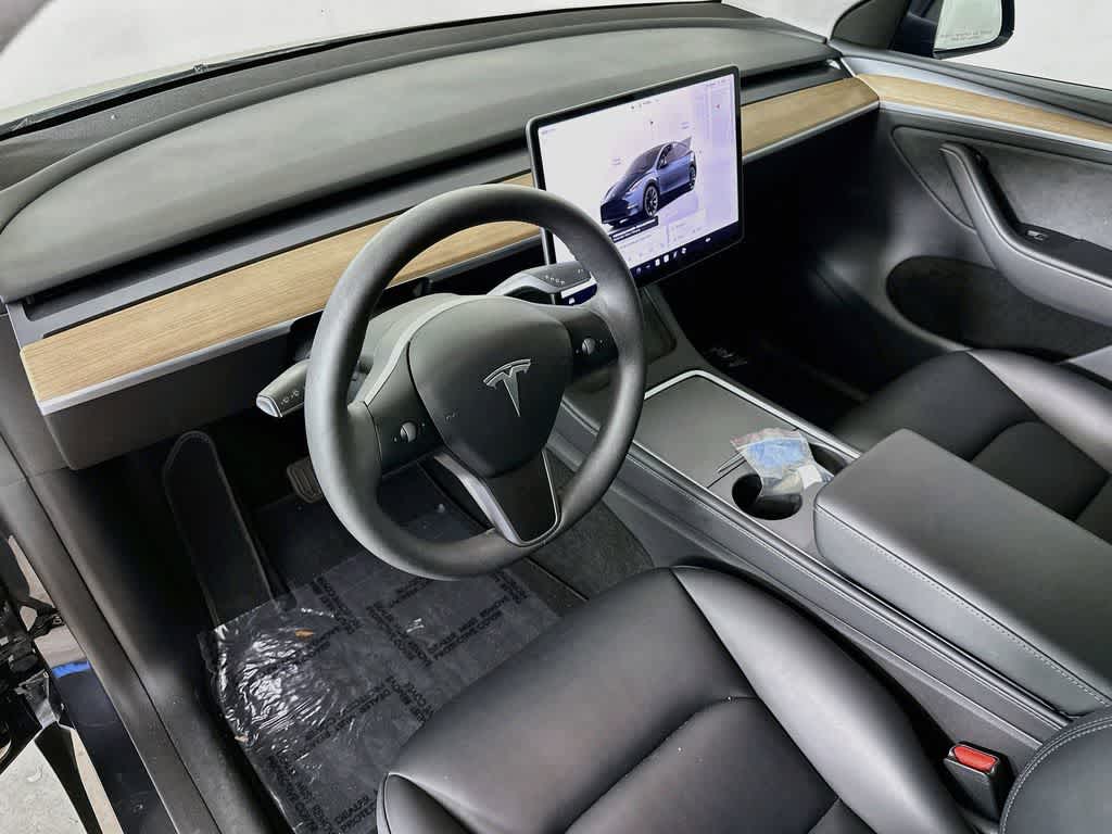 Used 2024 Tesla Model Y Long Range with VIN 7SAYGDEE1RA218392 for sale in Tampa, FL